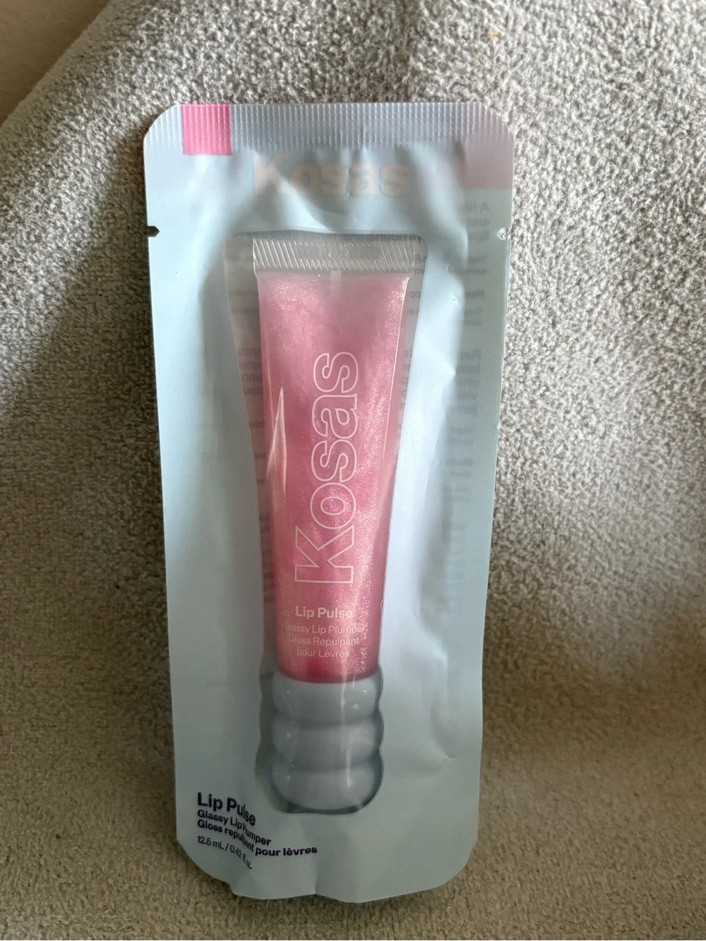 Kosas Lip Pulse Glassy Lip Plumper in the shade